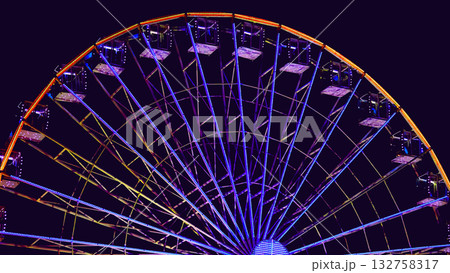 Colorful ferris wheel night evening.Amusement park Colorful ferris wheel night evening.Amusement park 132758317