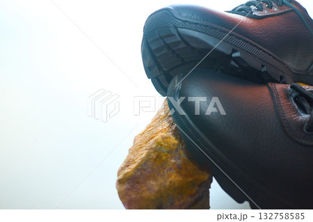 Pair of black leather sneaker shoe with laces 132758585