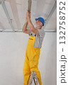 Senior adult worker fixing aluminum batten for gypsum ceiling 132758752