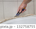 Bathroom renovation, old silicone removal 132758755