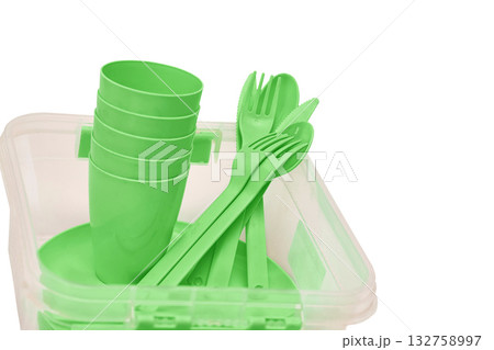 Green picnic set in a plastic box.Cups,plates,forks,knives,spoons 132758997