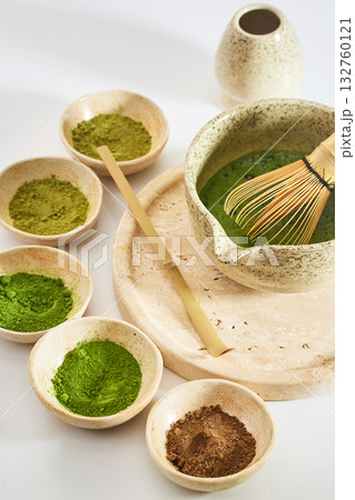 Matcha Ceremony Setup. Ceramic bowls with matcha powder and tools for a traditional tea ceremony 132760121