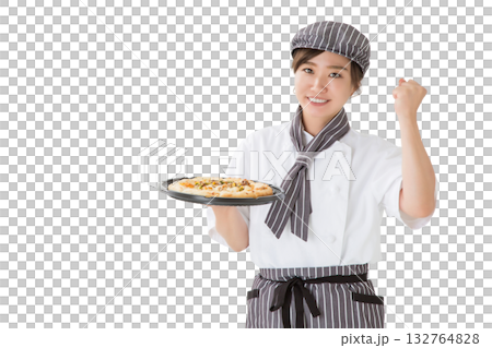 A young Asian woman in a chef's coat holding a pizza A young Asian woman in a chef's coat holding a pizza 132764828