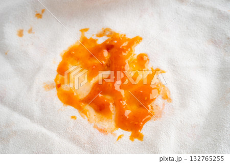 Dirty tomato sauce stain or ketchup on cloth. Dirty tomato sauce stain or ketchup on cloth. 132765255