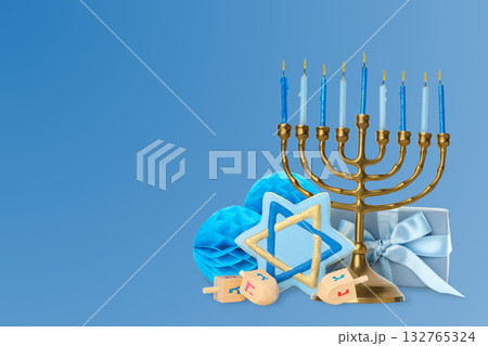 Hanukkah menorah surrounded by blue decorations and a gift box 132765324