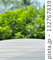Empty wood plank table top with blur green nature background bokeh light,Mock up for display or montage of product 132767839