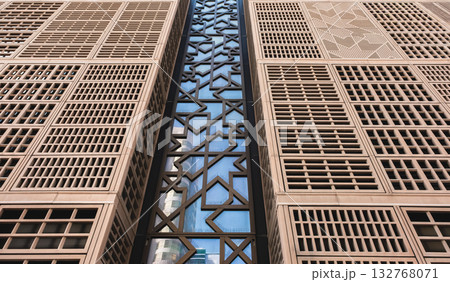 Contemporary skyscraper exterior unique design and reflective glass panels, abstract architecture 132768071