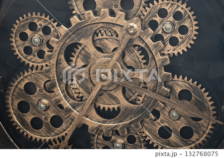 Vintage clock mechanism, close-up fragment with shiny gears, blue toned photo 132768075