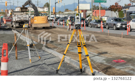 Construction site, laying new asphalt road pavement road construction machinery on highway 132768122