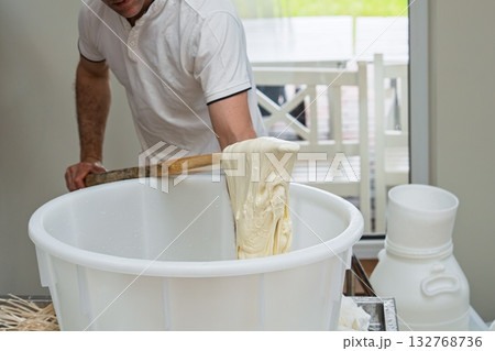 Crafting Fresh Mozzarella Cheese Artisan Skill and Traditional Italian Dairy Process 132768736