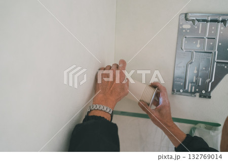 installation of an air conditioner installation of an air conditioner 132769014