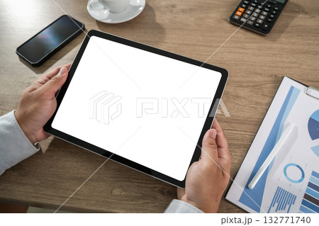 businessman holds a mockup tablet Blank Screen Mockup for UX/Presentation Mockup replaces your design 132771740
