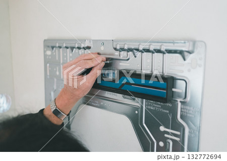 installation of an air conditioner installation of an air conditioner 132772694