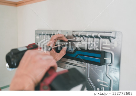 installation of an air conditioner installation of an air conditioner 132772695