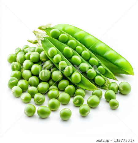 Fresh green peas displayed alongside open pods on a white background showcasing their vibrant color and texture 132773317