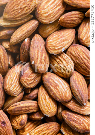 Almond. Close up of almond nuts background. Top view Almond. Close up of almond nuts background. Top view 132773410