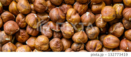 Hazelnuts. Close up of huzelnuts background. Top view Hazelnuts. Close up of huzelnuts background. Top view 132773419