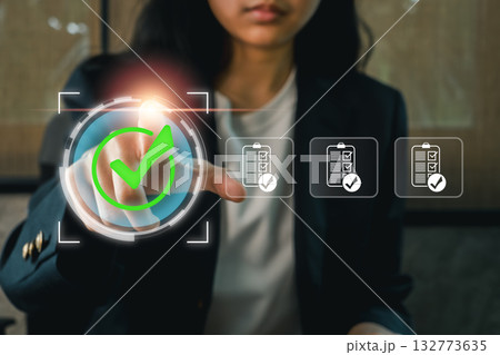 Businesswoman conducting an internal audit, focusing on data analysis and compliance in a corporate environment. 132773635