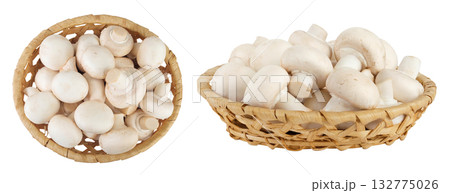 Fresh mushroom champignon in a wicker basket isolated on white background. Top view. Flat lay Fresh mushroom champignon in a wicker basket isolated on white background. Top view. Flat lay 132775026