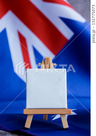 Mock-up for custom copy designs. Clean empty message board next to Australian flag. Place your logo or text on the white paper board next to the Australian flag. Modern mock-up template with national Mock-up for custom copy designs. Clean empty message board next to Australian flag. Place your logo or text on the white paper board next to the Australian flag. Modern mock-up template with national 132775073