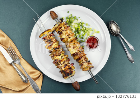 Grilled vegetable bacon kebabs. 132776133