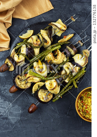 Freshly fish kebabs on skewers, barbecue. BBQ fish Freshly fish kebabs on skewers, barbecue. BBQ fish 132776138