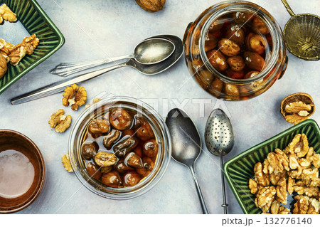Aromatic jam from green walnuts. Aromatic jam from green walnuts. 132776140