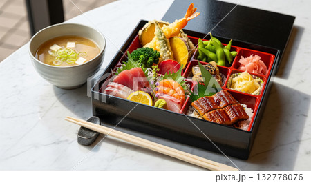 Japanese Deluxe Bento with Sashimi, Tempura and Miso Soup 132778076
