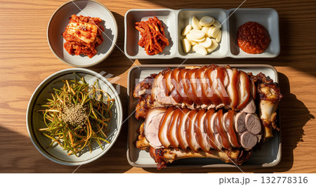 Korean Jokbal Platter with Kimchi and Garlic Sides 132778316