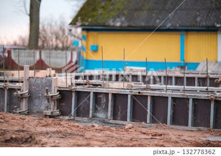 Construction of the foundation of a private house Construction of the foundation of a private house 132778362