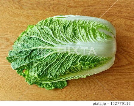 chinese cabbage on wooden background chinese cabbage on wooden background 132779115