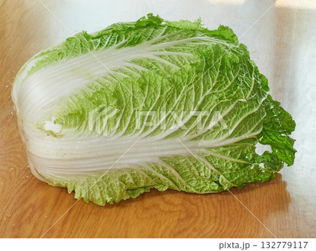 chinese cabbage on wooden background chinese cabbage on wooden background 132779117