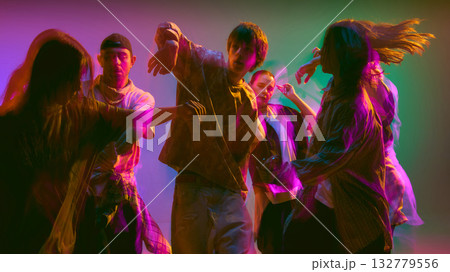 Contemporary dancers in expressive motion blur effect Contemporary dancers in expressive motion blur effect 132779556