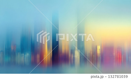 Early morning light casts soft colors over a city skyline. Tall buildings emerge through a hazy, blurred appearance, creating a serene and dreamlike setting as the day begins. 132781039