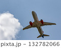 A jet passenger plane flies in the clouds 132782066