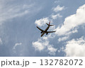 A jet passenger plane flies in the clouds 132782072