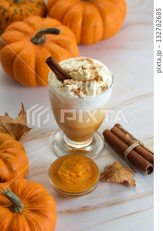 Autumn Pumpkin Spice Latte whipped cream and cinnamon 132782685