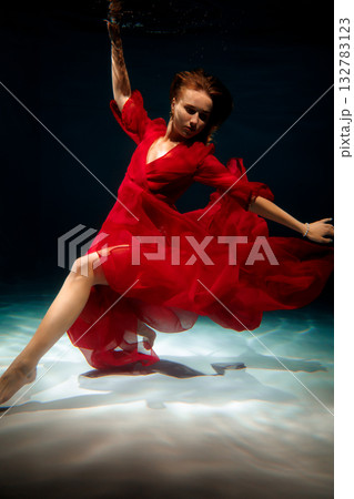 Elegant aquatic ballet, Underwater figure striking poignant dance 132783123
