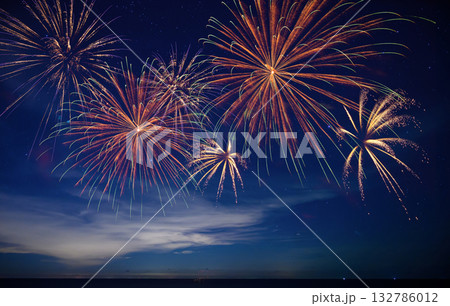 Stunning fireworks illuminate the night sky over the ocean, symbolizing celebration, hope, and the excitement of welcoming 2026 with bright new beginnings. Stunning fireworks illuminate the night sky over the ocean, symbolizing celebration, hope, and the excitement of welcoming 2026 with bright new beginnings. 132786012