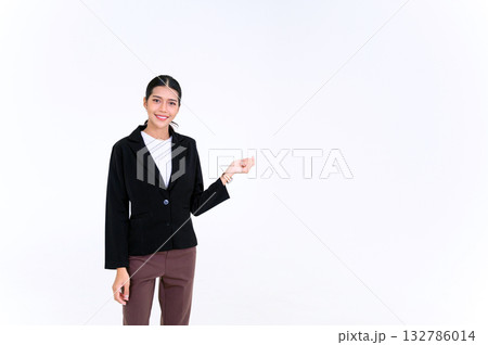 Smiling young Asian businesswoman presenting something, looking at the camera isolate on white background. making video call, recording webinars, online course. Smiling young Asian businesswoman presenting something, looking at the camera isolate on white background. making video call, recording webinars, online course. 132786014