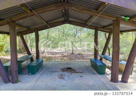 An old wooden picnic shelter in a forest in the Blue Mountains An old wooden picnic shelter in a forest in the Blue Mountains 132787314