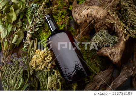 Vintage bottles with tinctures and various dried herbs. Vintage bottles with tinctures and various dried herbs. 132788197
