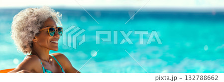 Black mature woman relaxing by poolside in swimsuit, enjoying sunny day and summer ocean holiday vibes Black mature woman relaxing by poolside in swimsuit, enjoying sunny day and summer ocean holiday vibes 132788662