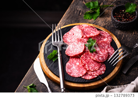 Sliced spicy tasty salami sausage 132789373