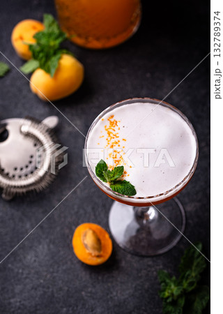 Fresh apricot cocktail martini with mint 132789374