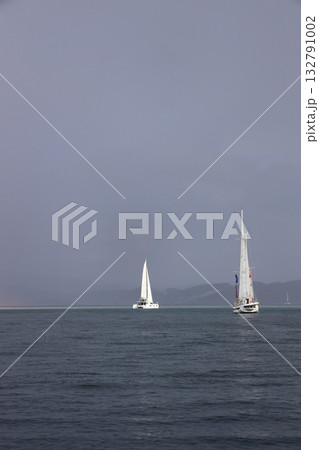 Sailing under the rainbow in the Aegean Sea. Sailing under the rainbow in the Aegean Sea. 132791002