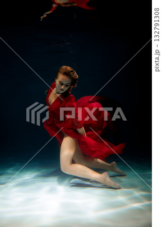Deep feminine reflection, Serene female underwater portrait scene Deep feminine reflection, Serene female underwater portrait scene 132791308