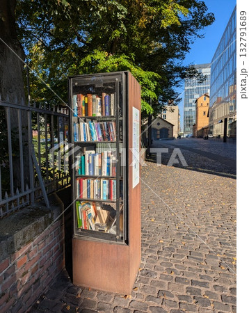 A free book exchange kiosk for local residents and visitors to Cologne 132791689