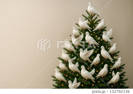 A Christmas tree decorated with white doves. Space for text. A Christmas tree decorated with white doves. Space for text. 132792136