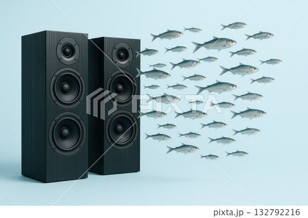 Fish flying out of the speakers like sound and music. Space for text. 132792216